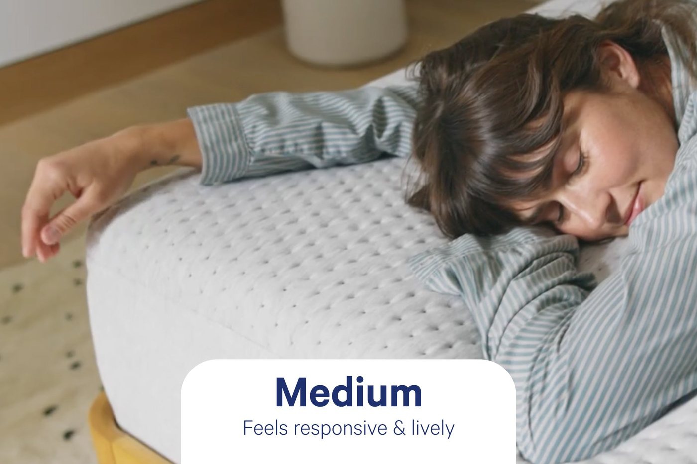 Casper Dream Hybrid mattress official product photo on a bed frame