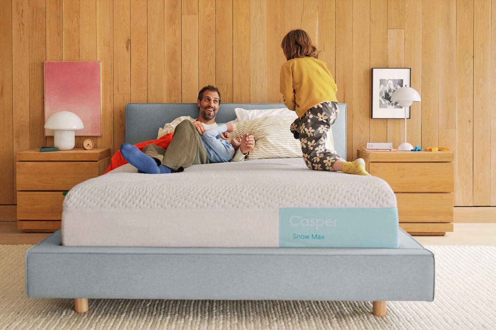 Casper Snow Max Hybrid mattress styled in a bedroom
