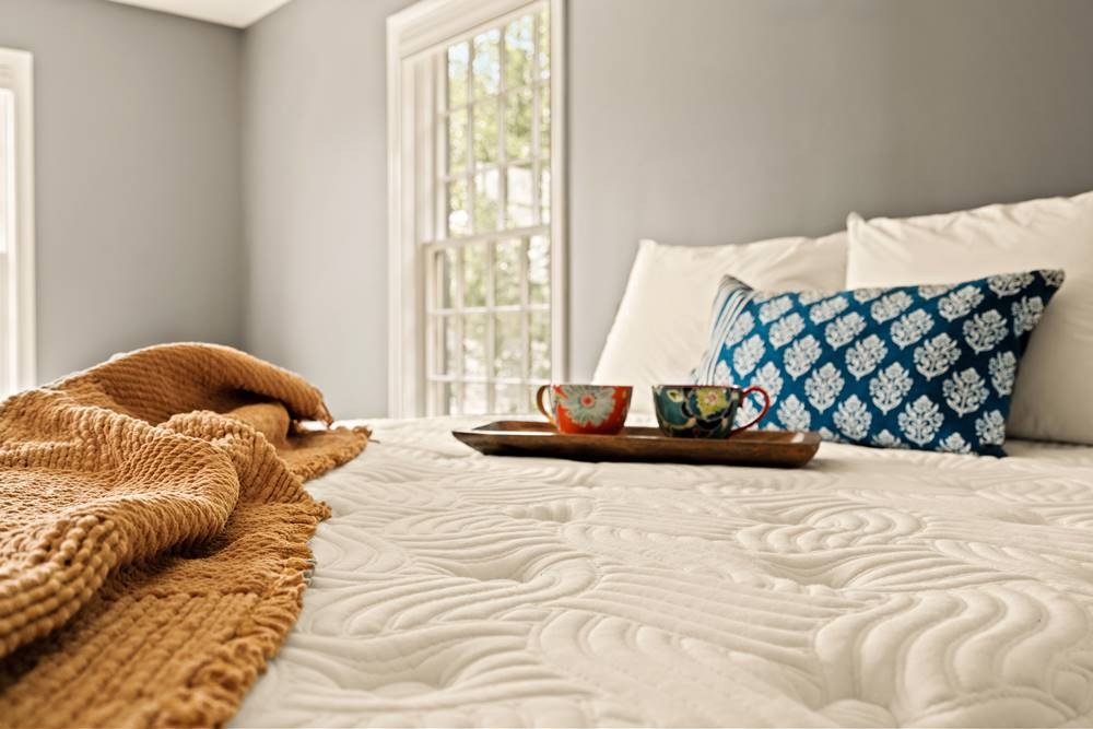 DLX Premier Hybrid (Medium) mattress photographed from the side