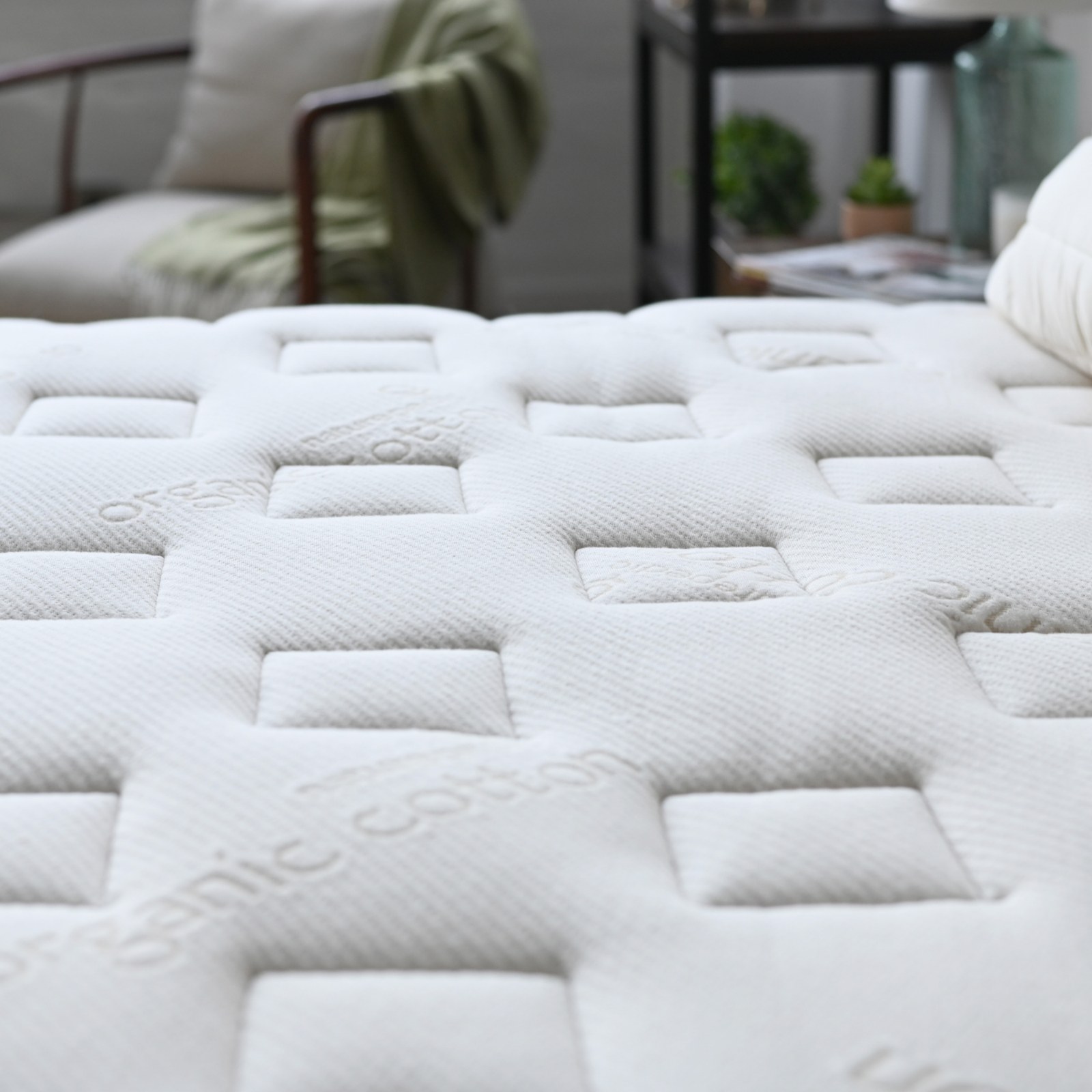 Close view of the Naturepedic EOS Trilux Organic cover and comfort layers