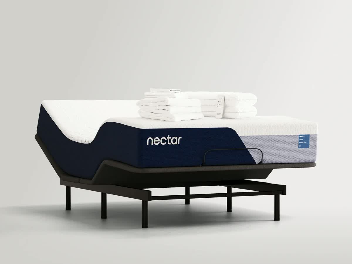 Nectar Classic mattress and adjustable base styled in a bedroom