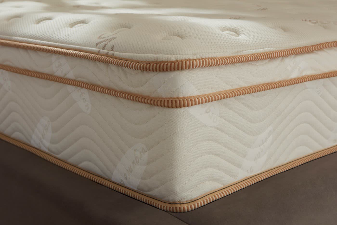 Close-up of the Saatva Classic organic cotton cover and piping