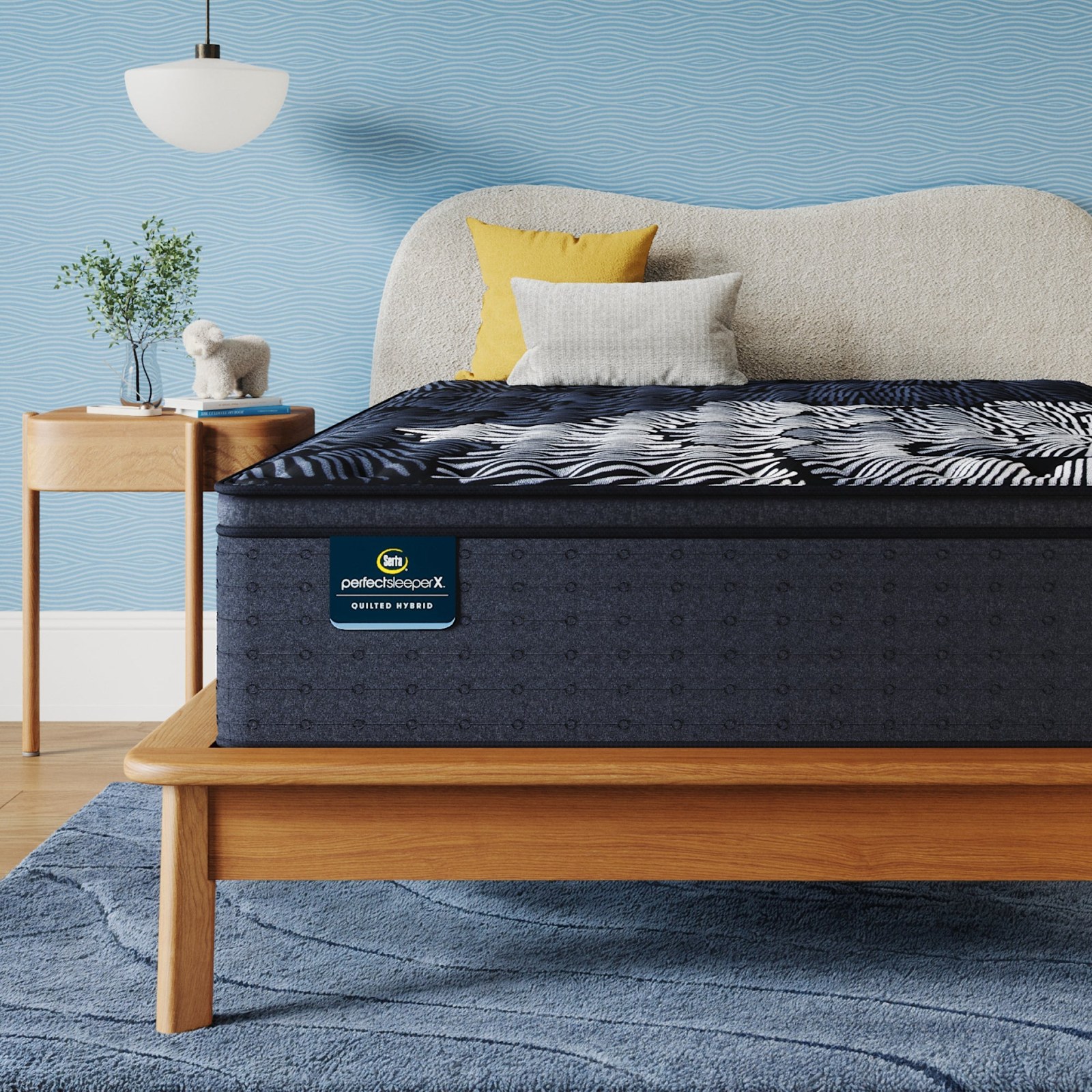 Serta Perfect Sleeper X Quilted Hybrid Level Two mattress photographed from the side