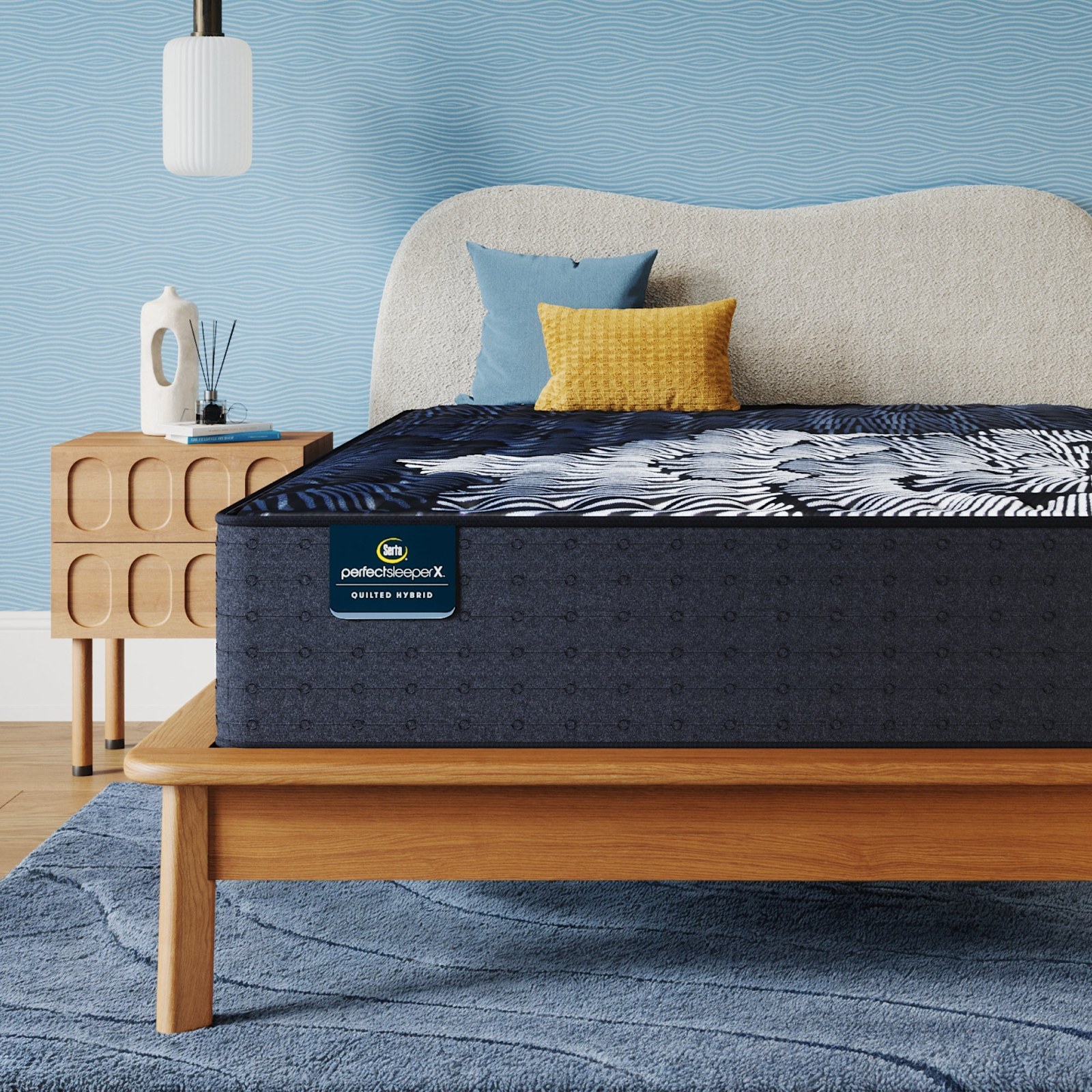 Close view of the Serta Perfect Sleeper X Quilted Hybrid Level Two cover and comfort layers